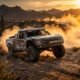 Ilustración: camioneta de carreras avanzando por el desierto de Baja California Sur al atardecer, entre cactus y una nube de polvo