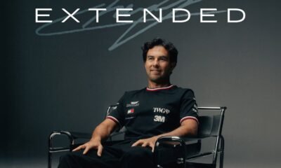 Checo Pérez posa sentado con la playera de Cadillac Formula 1 Team junto a la palabra Extended, que anuncia la extensión de su contrato